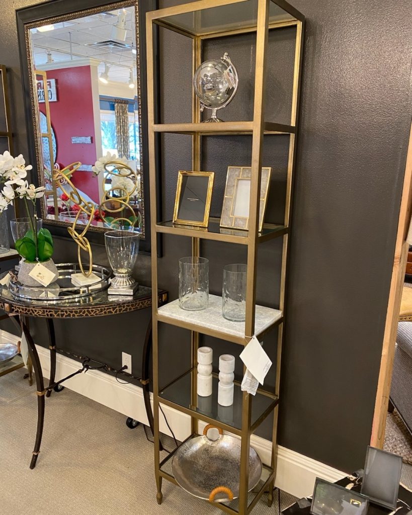 We just love this beautiful gold, iron and marble etagere. It stands 80
