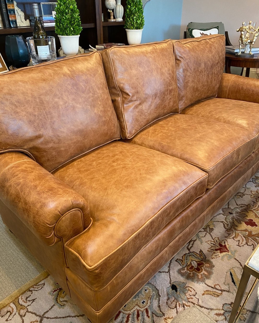 This beautiful distressed leather sofa is a timeless piece that